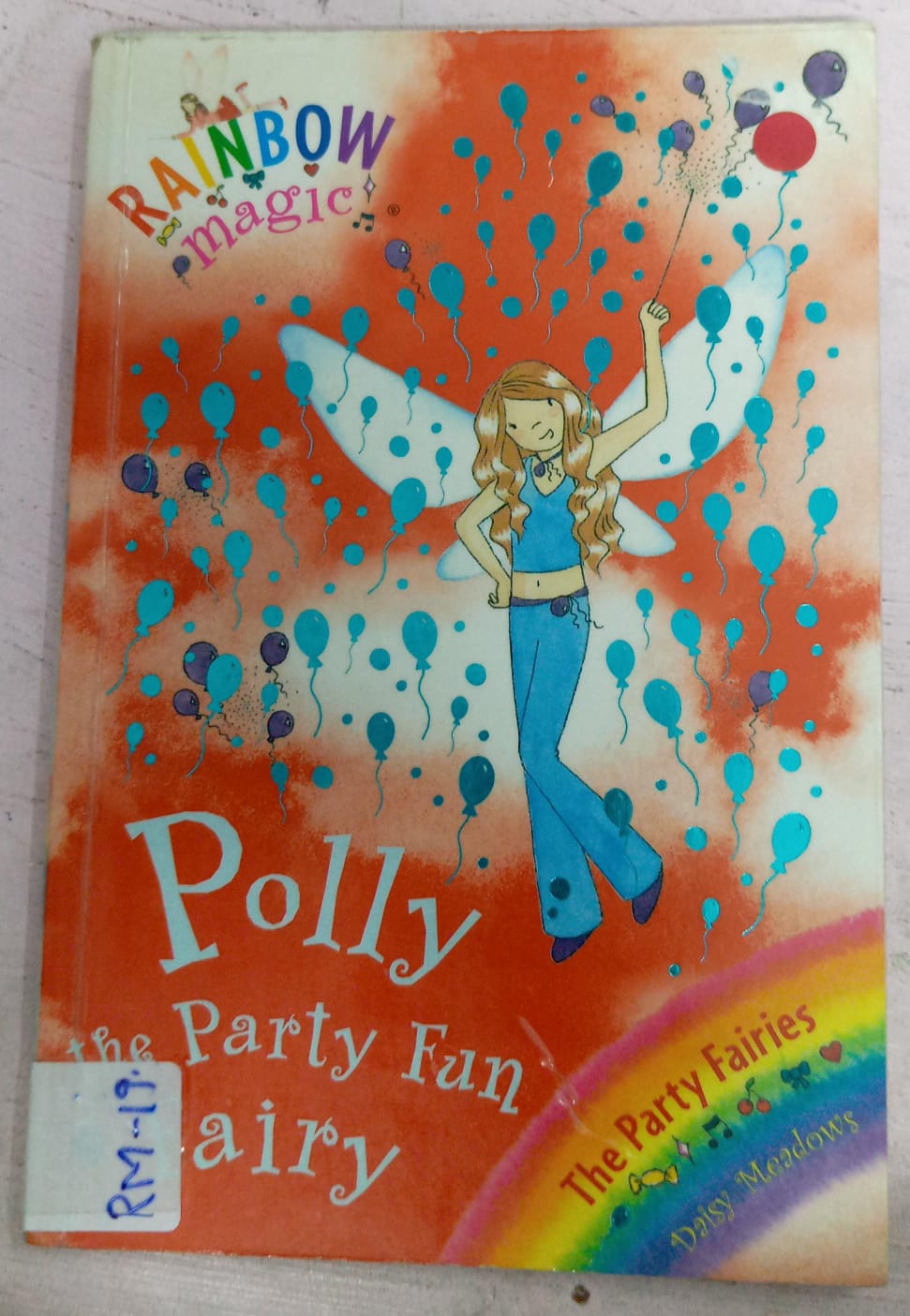 RAINBOW MAGIC: POLLY THE PARTY FUN FAIRY – RM-19