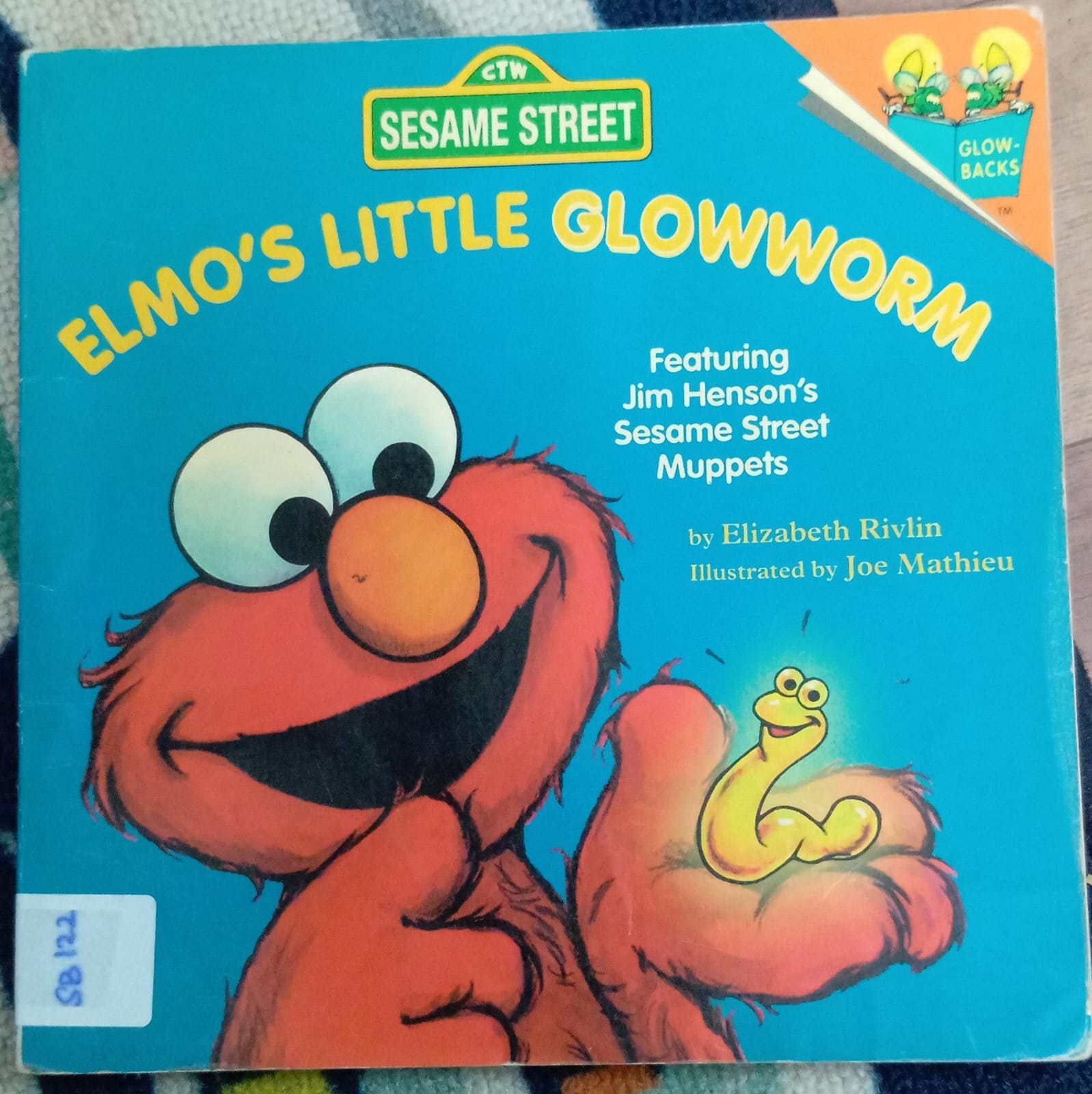 ELMO'S LITTLE GLOWWORM
